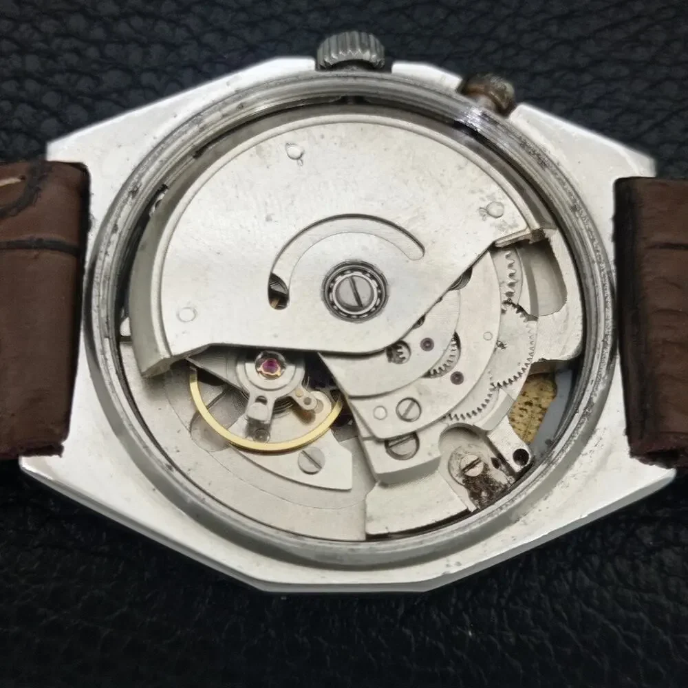 Vintage 1971 Ricoh Automatic Mens Silver Watch W/daydate & Red accents